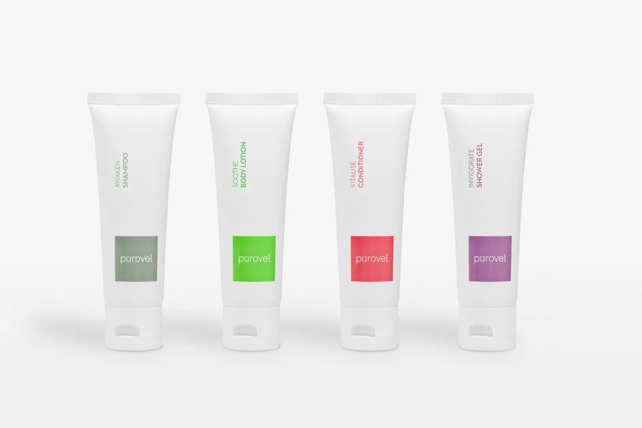 Paradox Singapore Merchant Court At Clarke Quay Εξωτερικό φωτογραφία The photo shows four tubes of cream or lotion, each with a distinct color label. The tubes are all white with a flip-top cap at the bottom. From left to right, the first tube has a green label, the second a darker green, the third a red label, and th